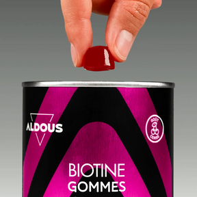 Prise de Biotine en gummies Aldous avec dose du complément
