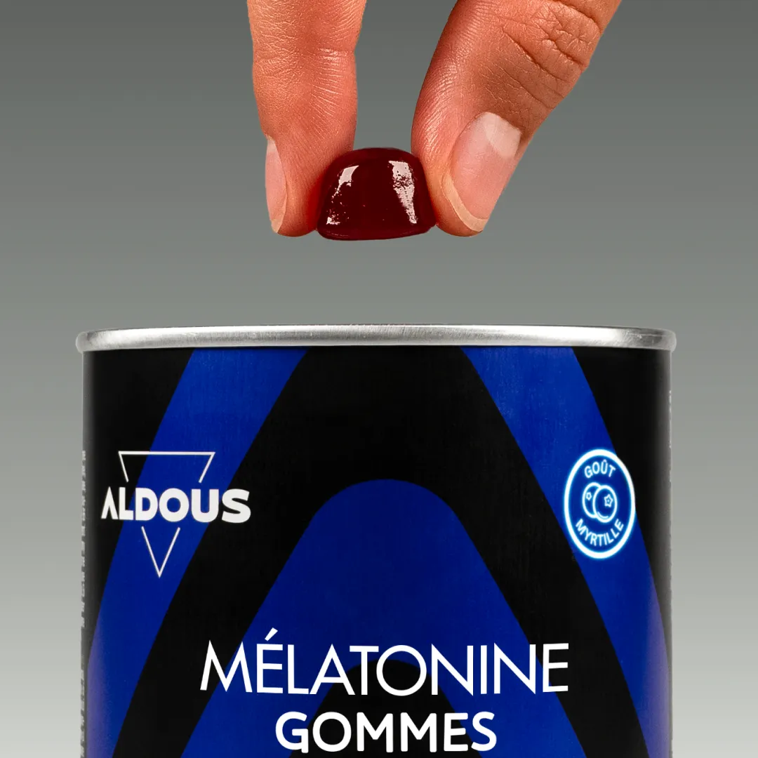 Prise de Mélatonine en gummies Aldous avec dose du complément