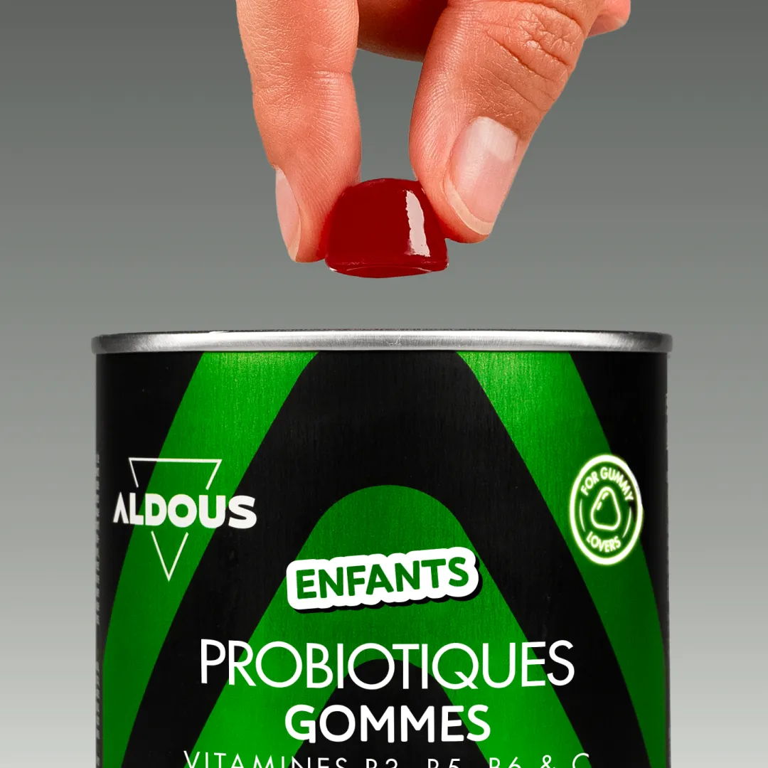 Prise de Probiotiques enfants en gummies Aldous avec dose du complément